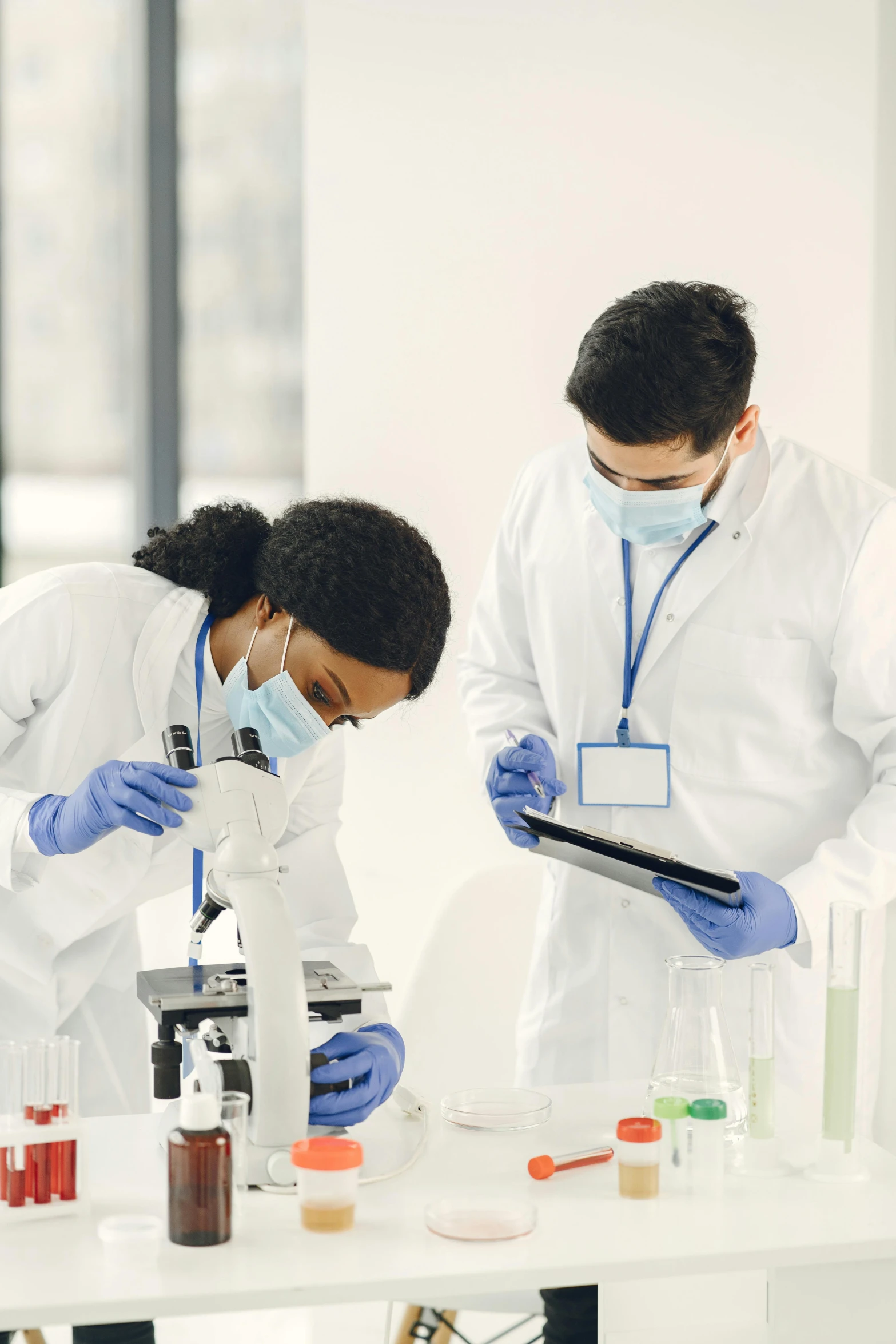 two students doing research at a science lab
