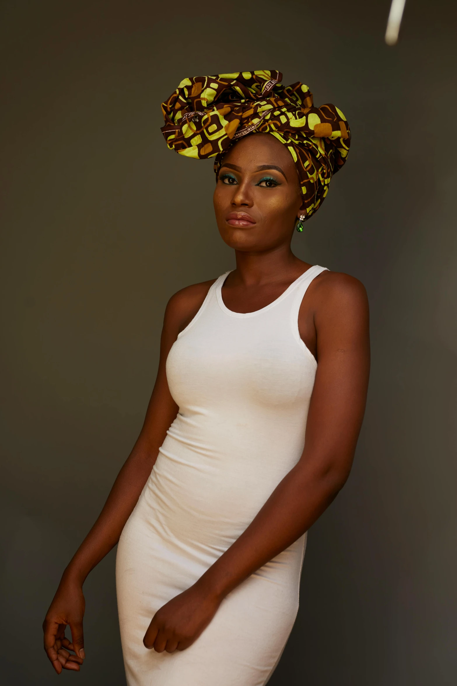 a woman in white dress and hair with fruit