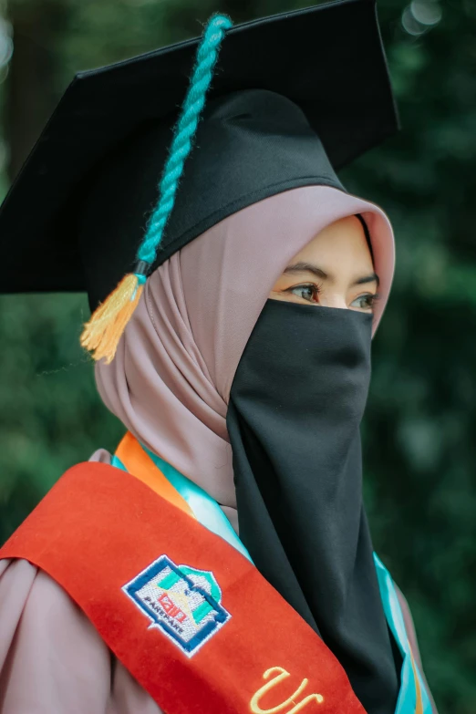 an image of a person wearing a graduation gown