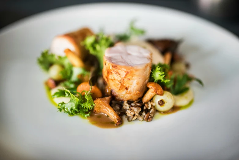 a plate of food with green vegetables on it