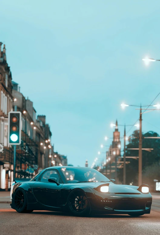 a sports car parked on the side of a city street