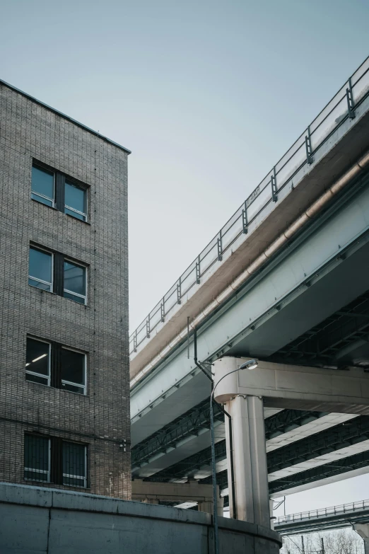 the back side of an apartment building with lots of windows