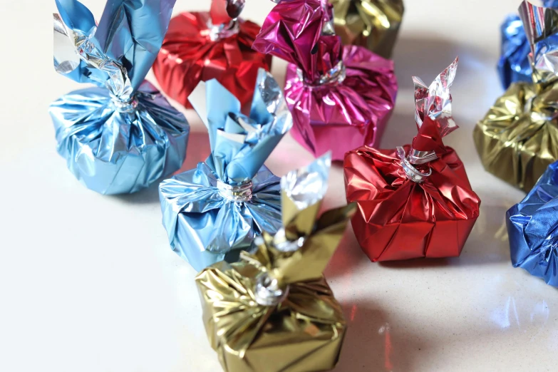 a lot of small colorful paper bows