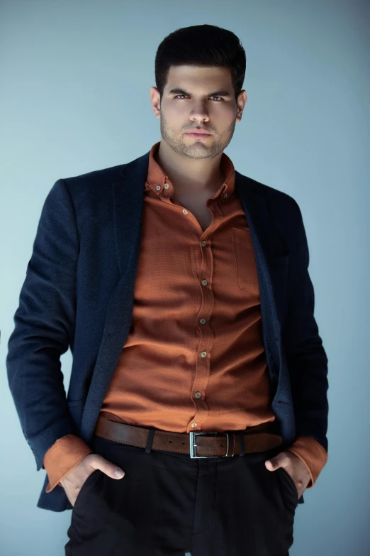 young man in casual suit posing for a pograph