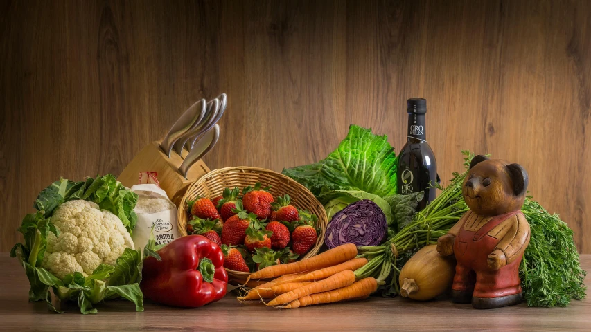 a collection of vegetables and fruits on a table