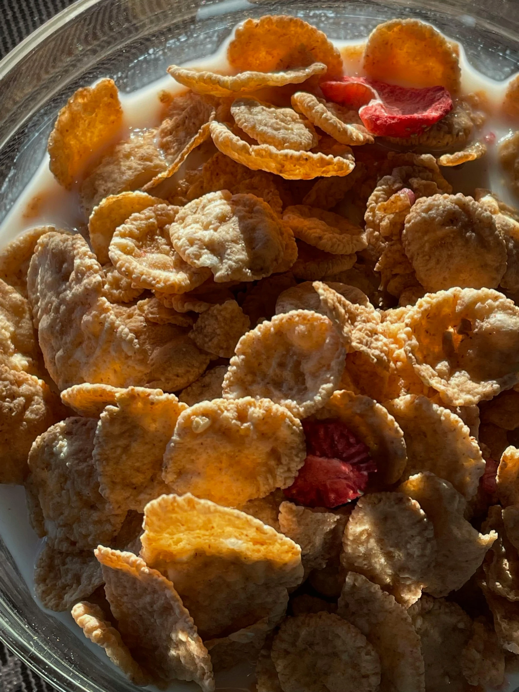 a bowl filled with food with oranges and red onions