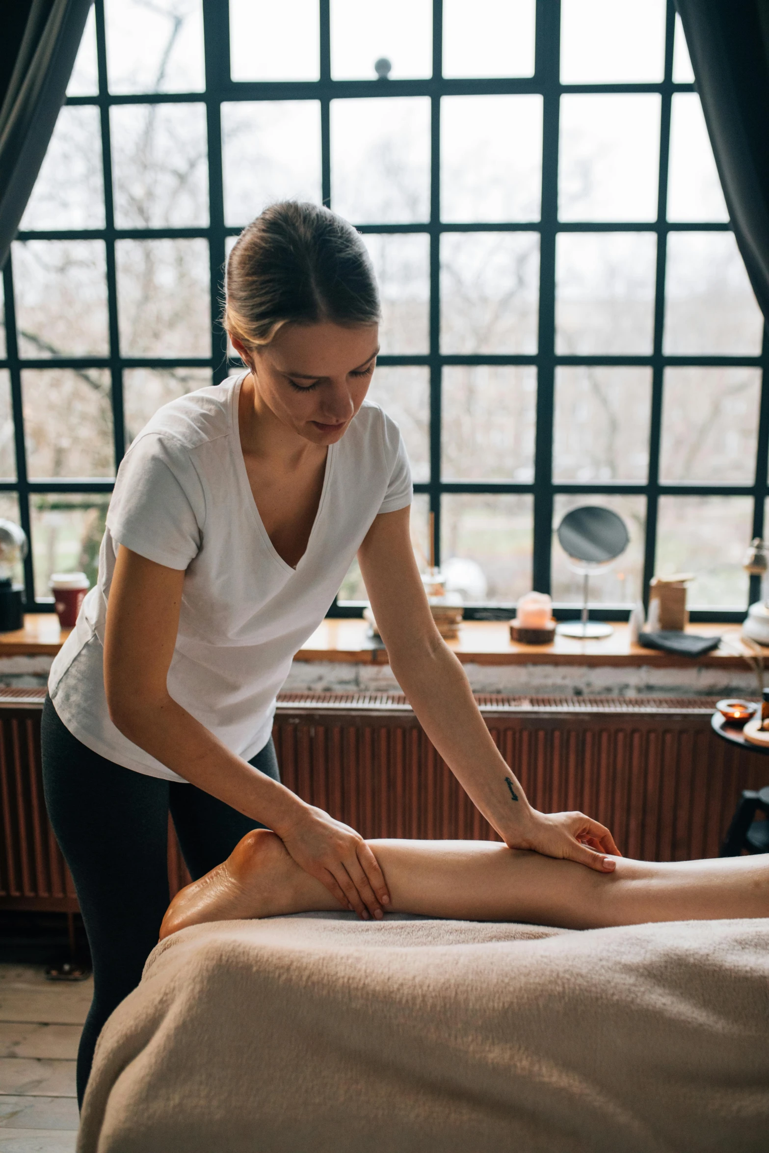 woman getting  stone massage at the health resort