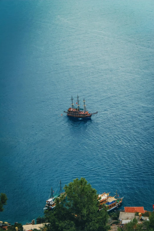 a boat floating on top of a large body of water