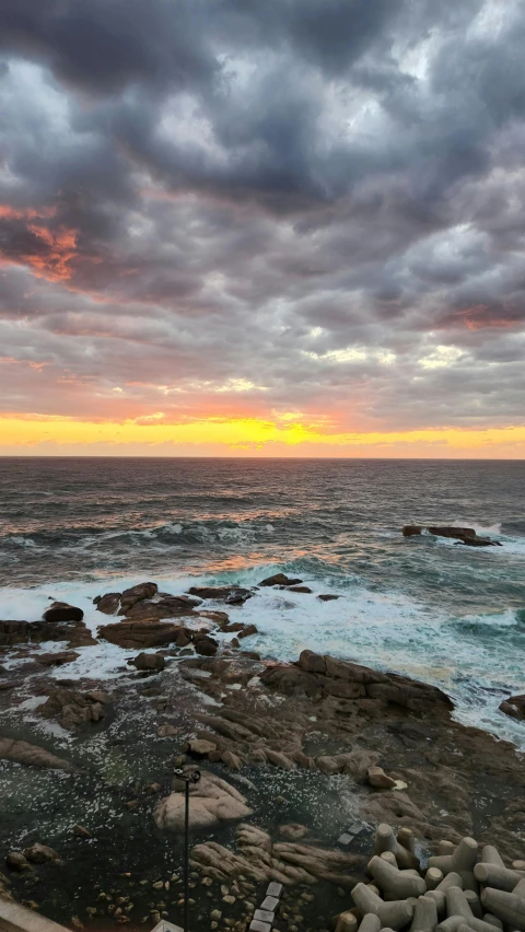 the view of an ocean from a pier