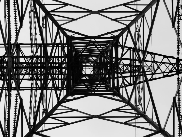 a tall metal structure with lots of wires