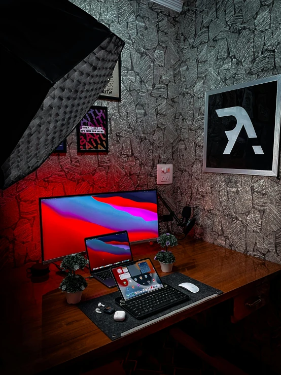 a desktop computer sitting on top of a wooden desk