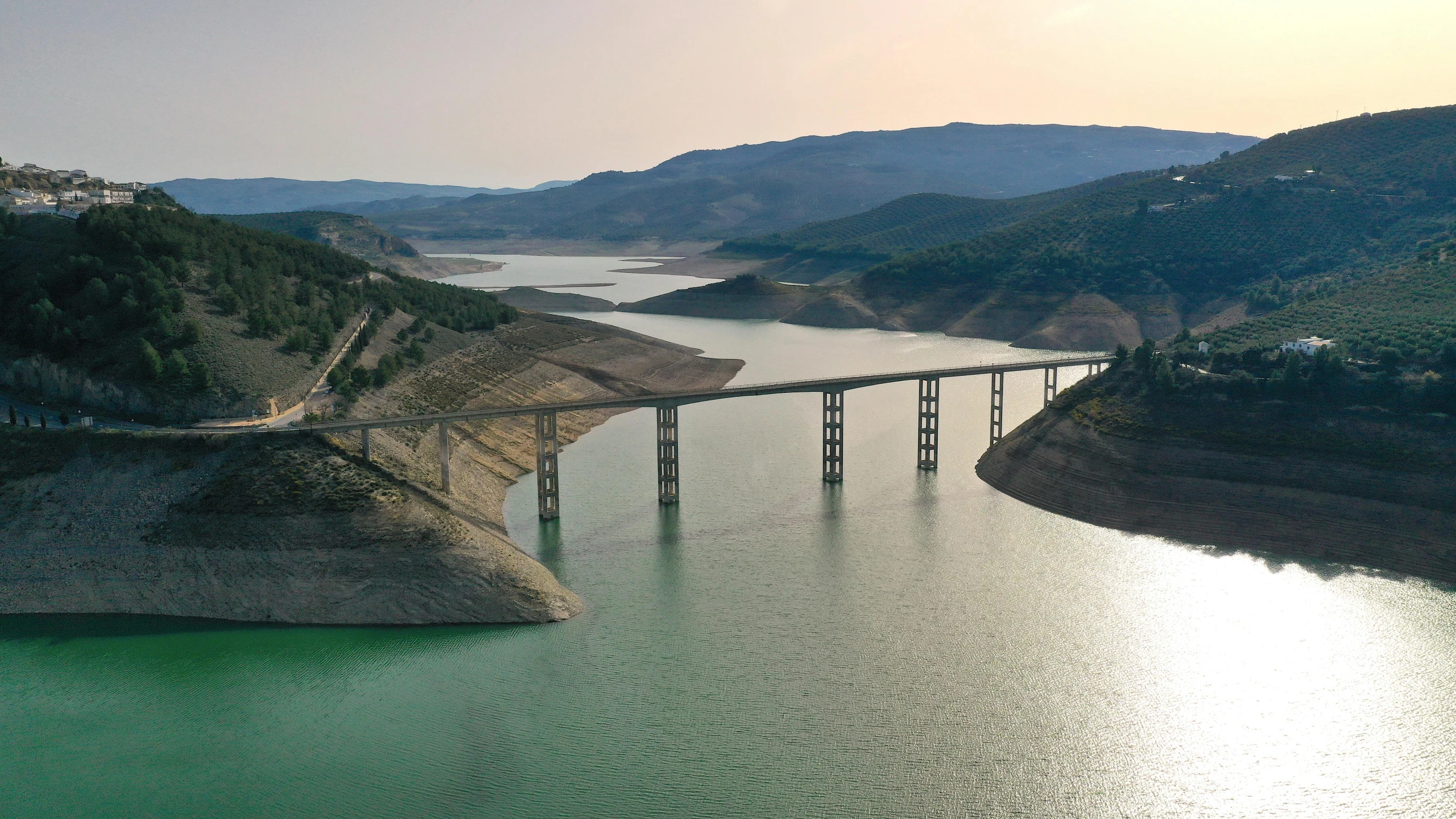 a large bridge spanning over a wide body of water