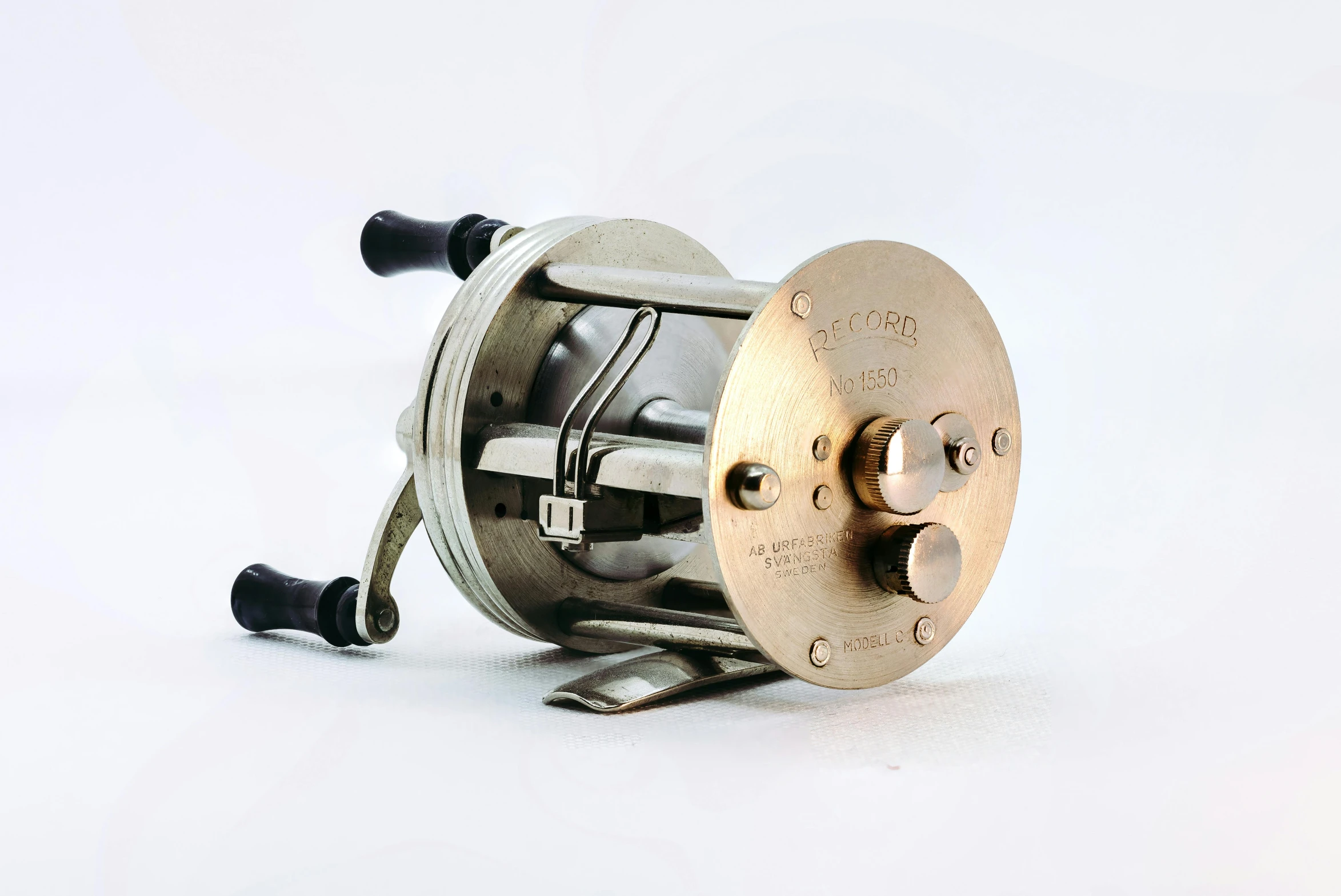 an image of a spinning reel on the ground