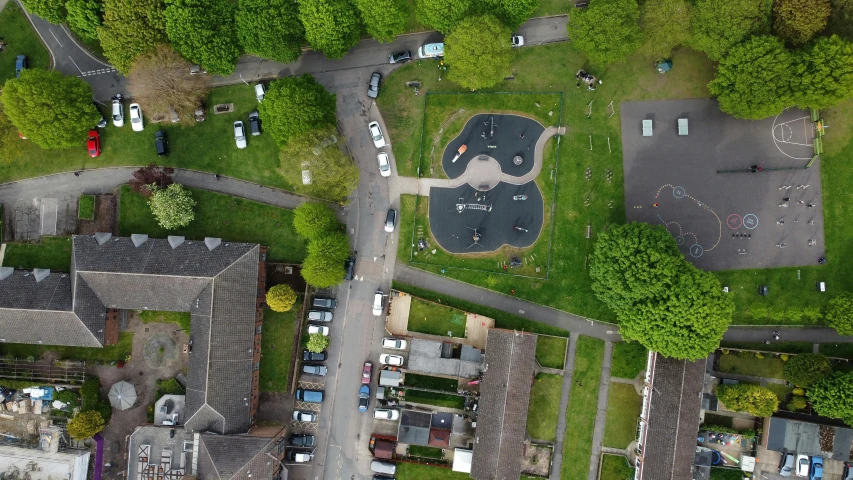 aerial view of cars parked at a park