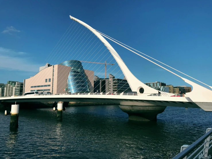 a long bridge that has buildings in it