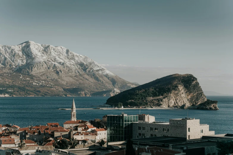 a picture taken from a hill looking down at the town