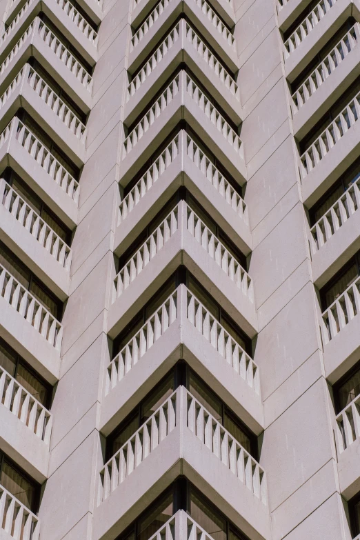 a building that has many balconies on it