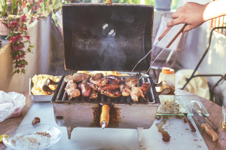 there are several grilled meats in a pan on the table