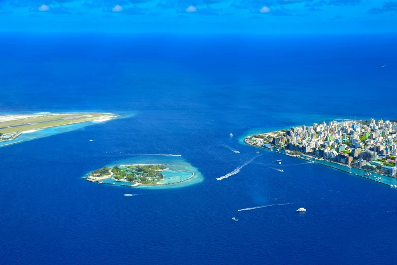 a bird - eye view of an island that has many small islands in the water
