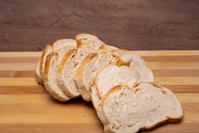 a sliced loaf of bread sitting on a table