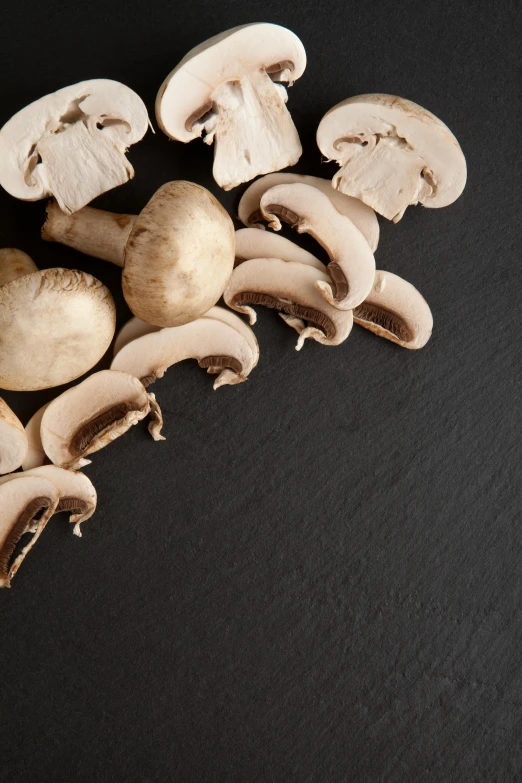 the mushrooms have been sliced on the counter