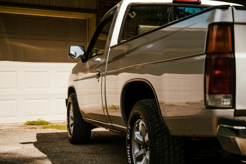 a large silver truck parked on a street