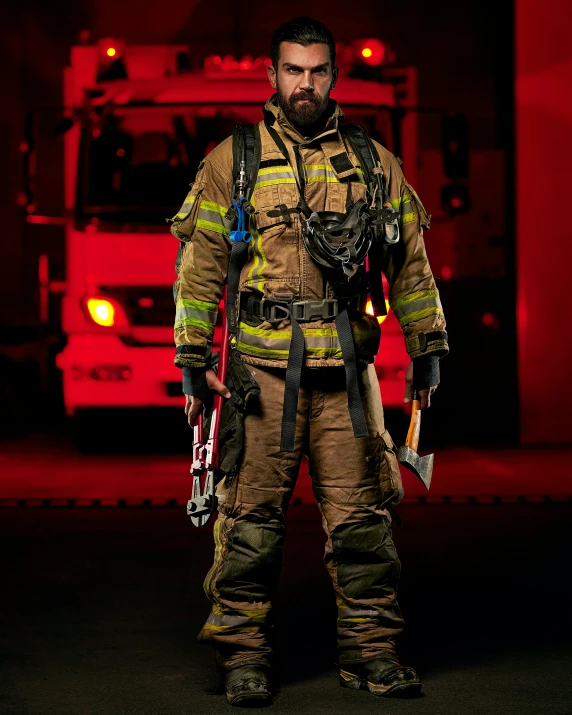 a fireman in uniform with the hood on and equipment