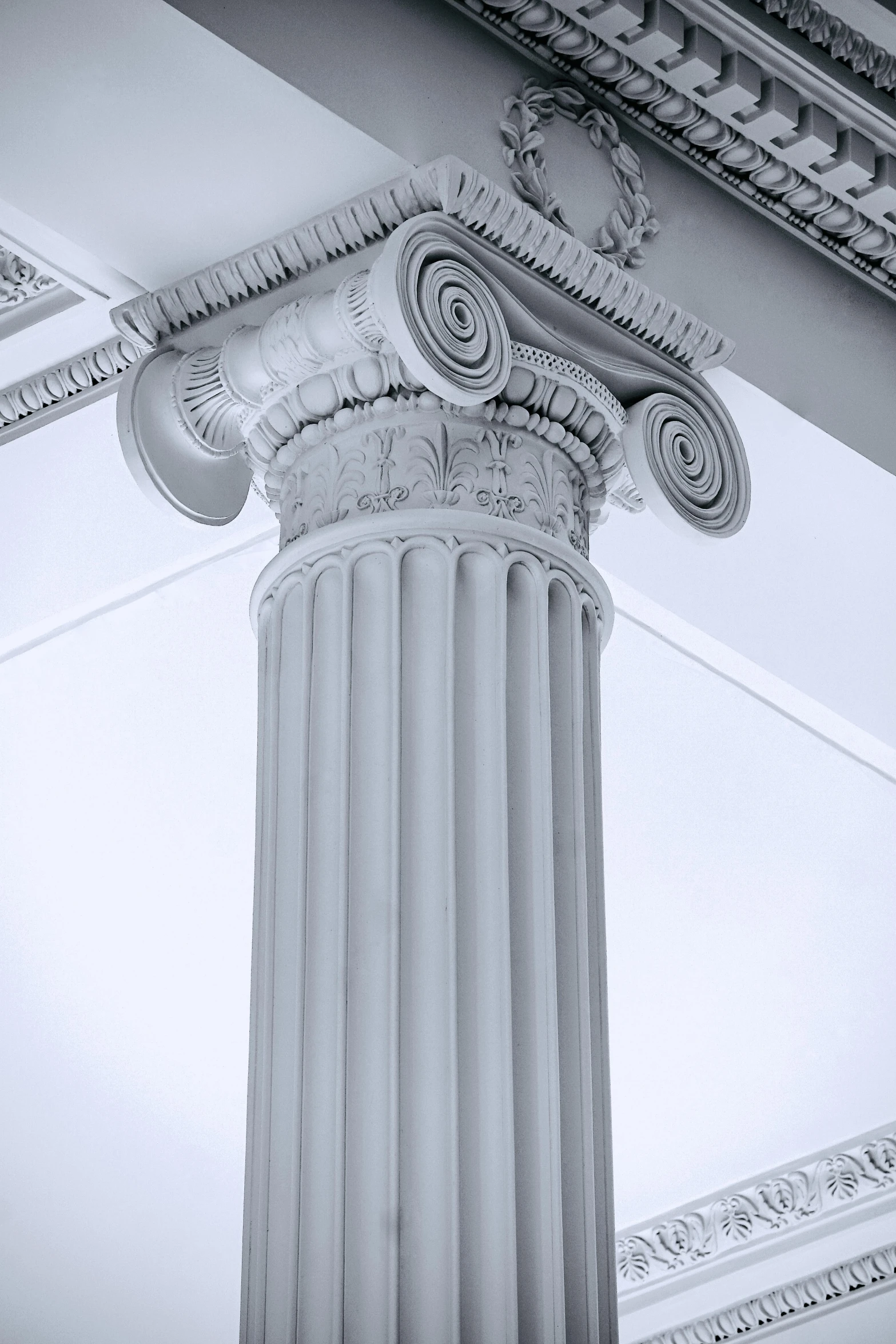 a column with carved designs on the outside