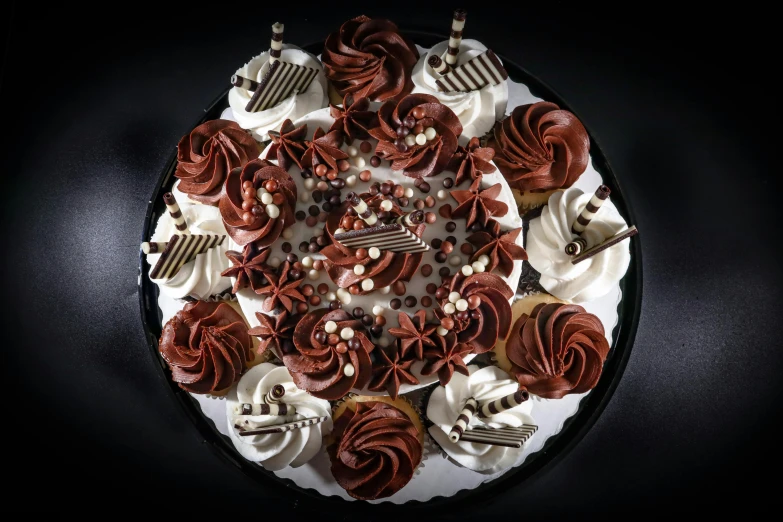 a decorated cake on a table with different kinds of decorations