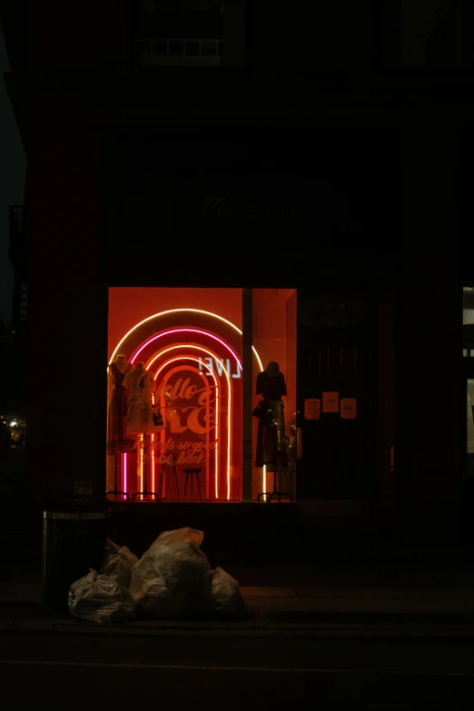 an open doorway with neon lights is shown