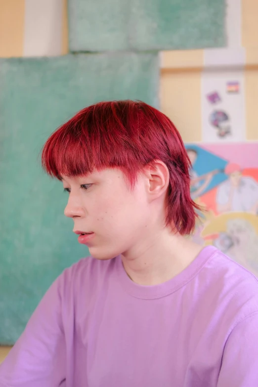 a woman with red hair staring at soing