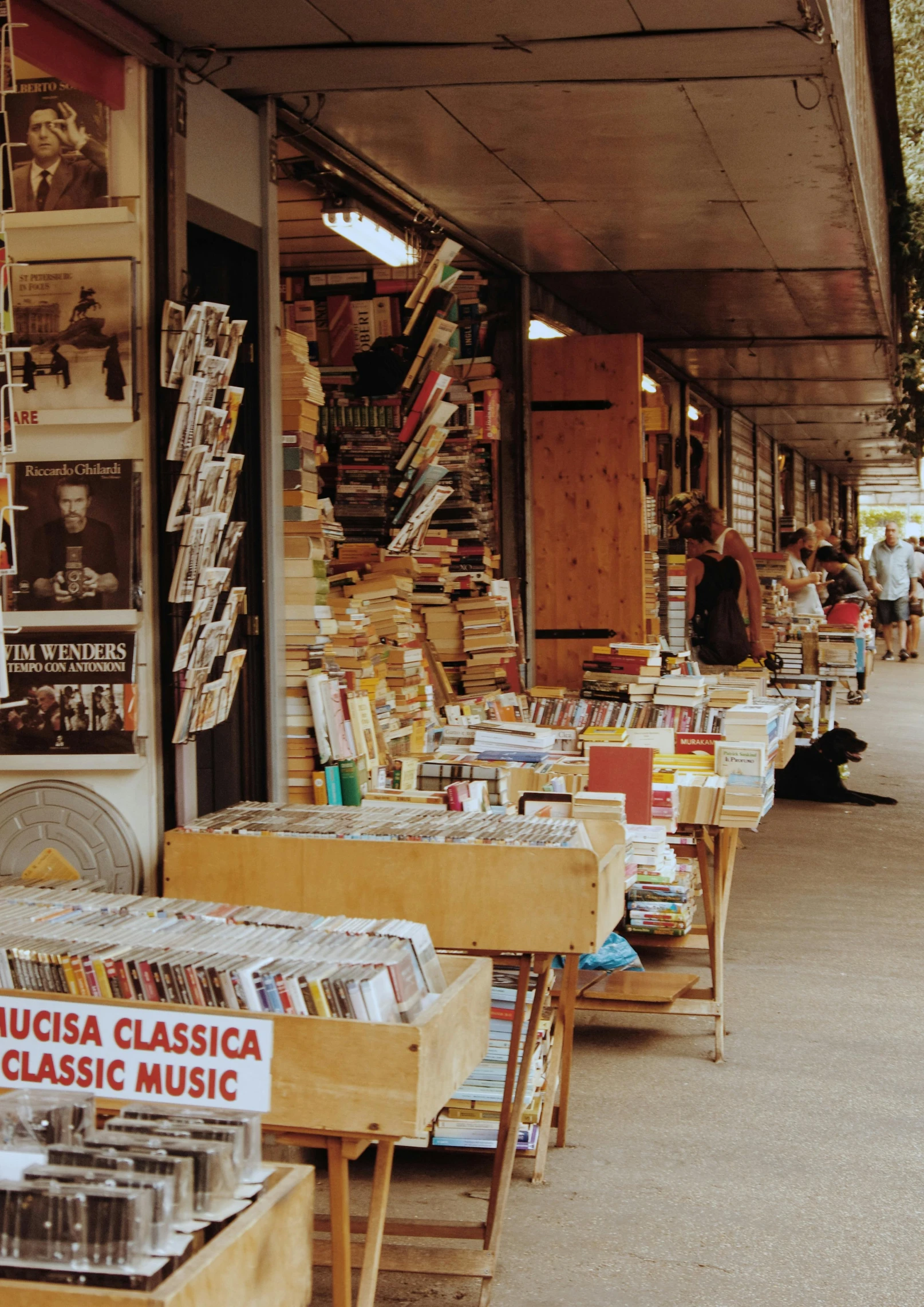 a group of wooden tables full of books