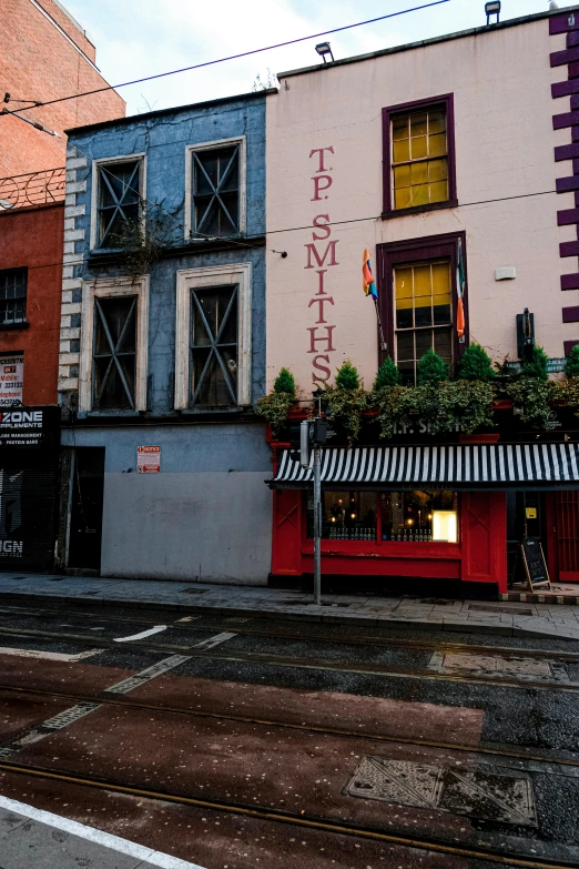 an urban scene with the word east side painted on the building