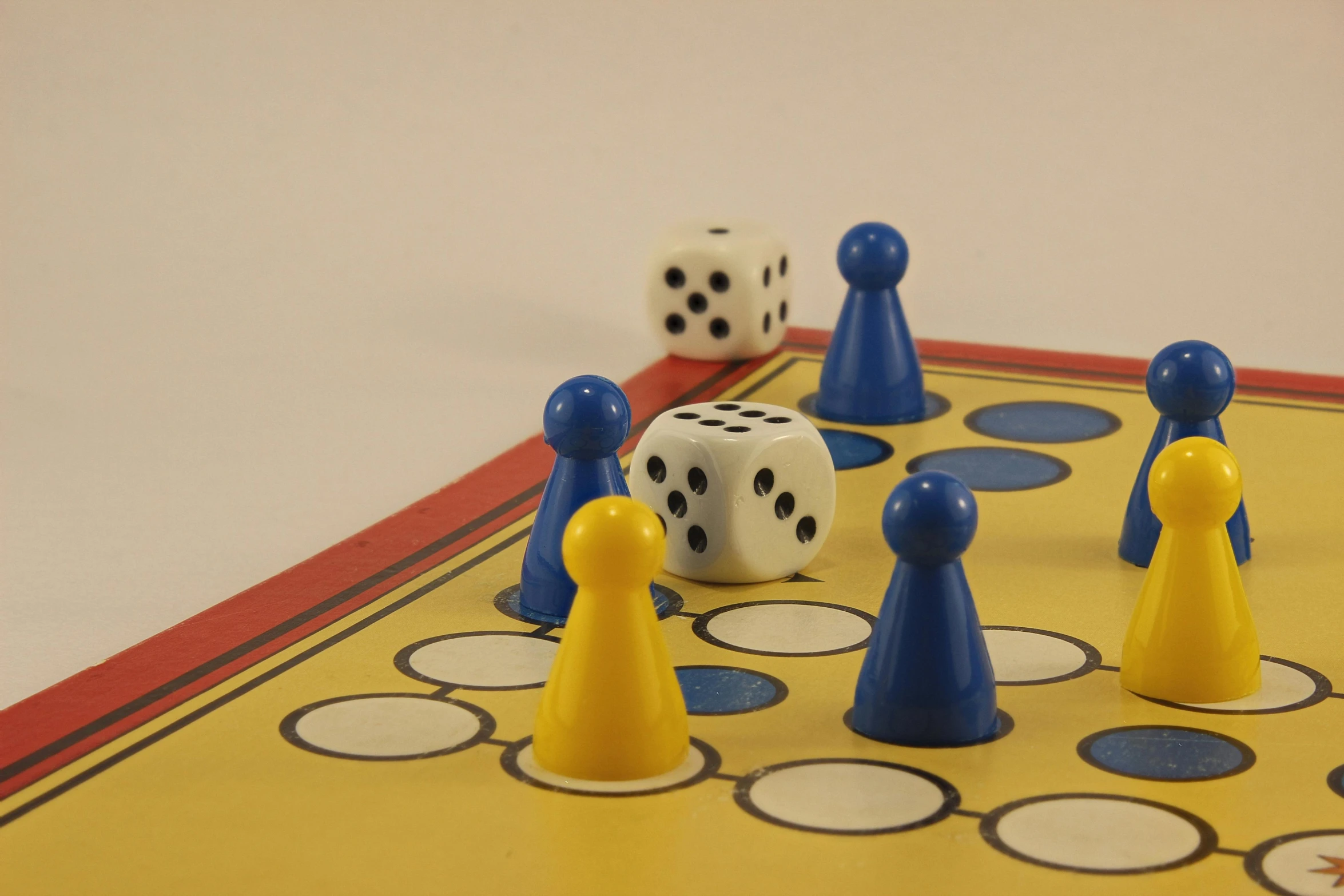 a close up of a game board with dices