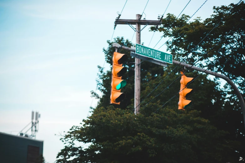 a street sign hanging from a metal pole