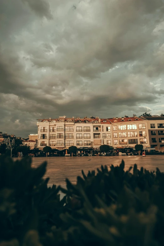 a cloudy sky is seen over a city