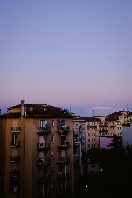 an apartment building on the opposite side of a city