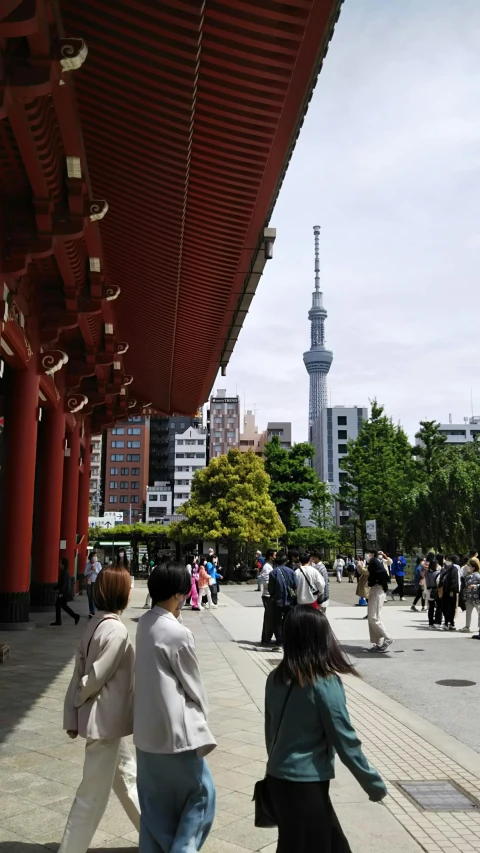 three women walking up and down a path