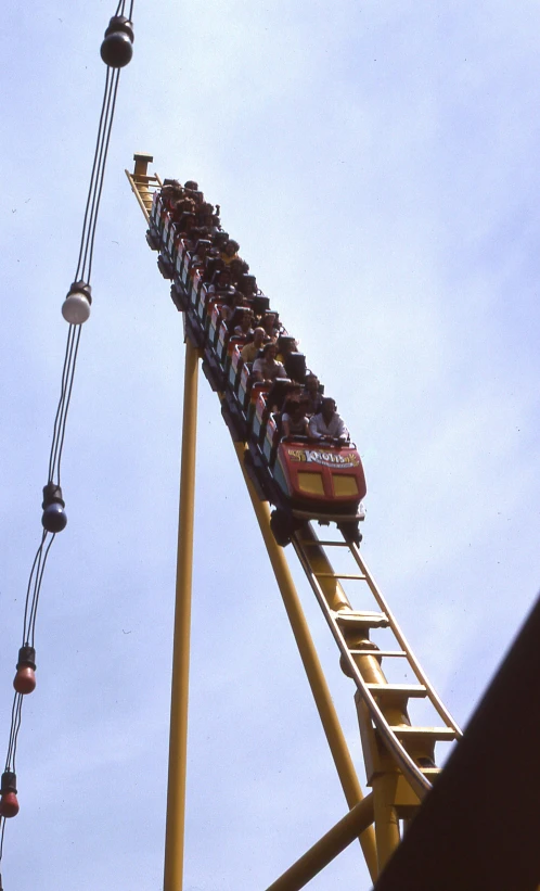 people riding the six person roller coaster in amut park