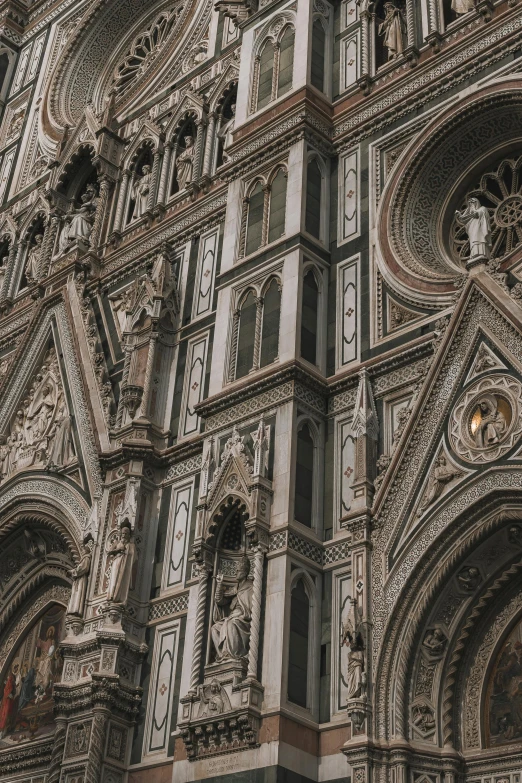 the side of an old building with fancy architectural details