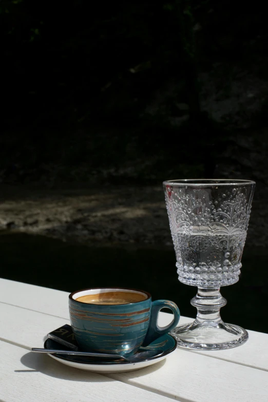 a close - up of a cup and saucer on a table