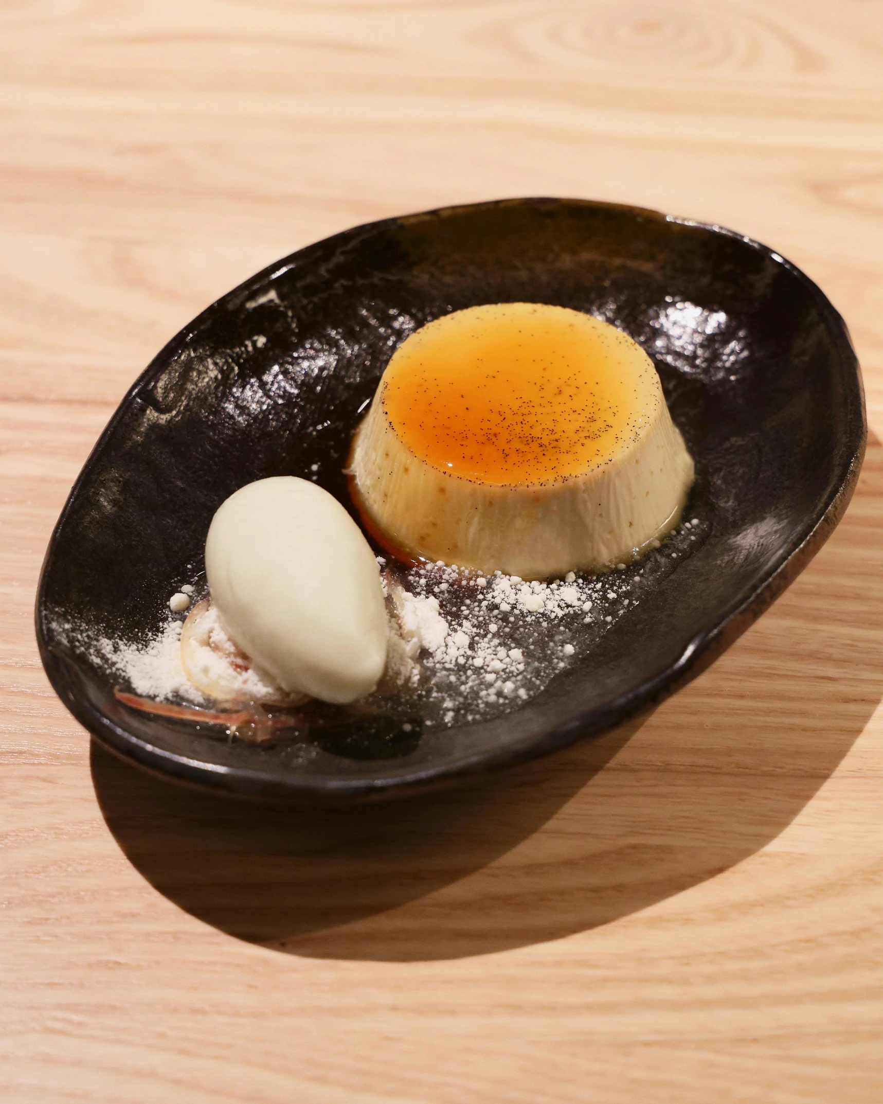 the chocolate dessert is topped with a boiled egg