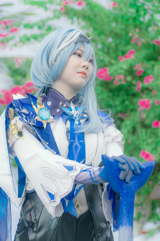 a woman with blue hair and armor stands next to some flowers
