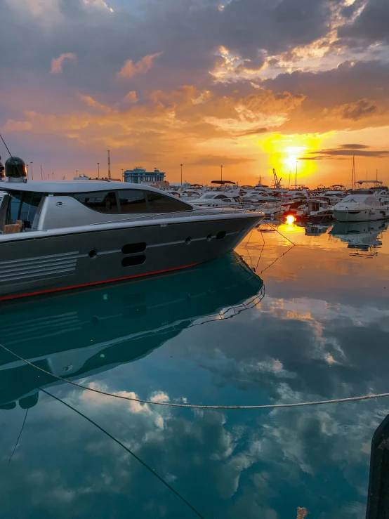 a boat in a marina on a cloudy day