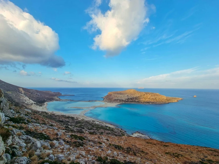 the ocean, with an island in the middle