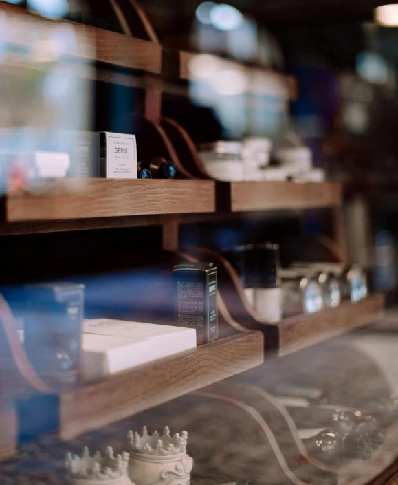 the window display in the store reflects the shelves of the restaurant