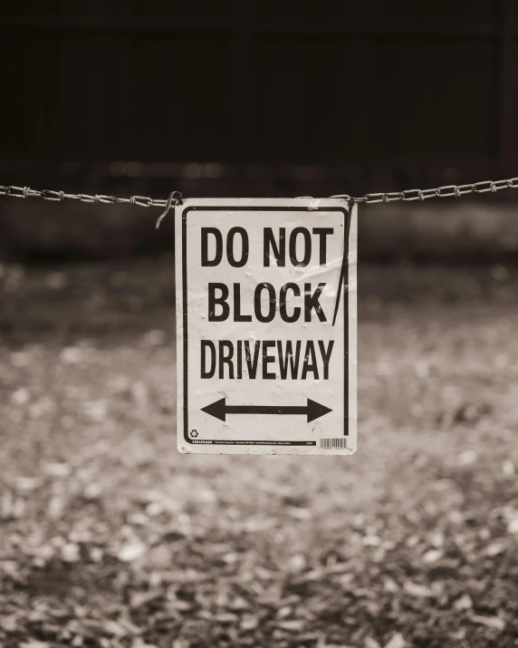 do not block the way to your driveway sign