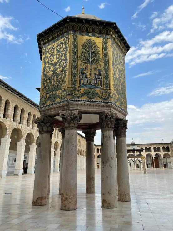 a picture of a building with decorative columns and a dome