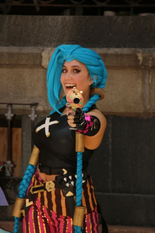 a woman with blue hair holding two different guns