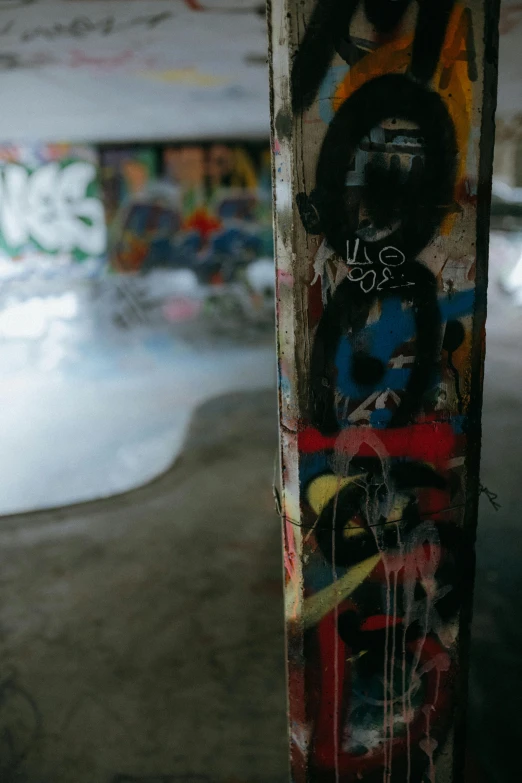 a skateboard is shown with graffiti on it